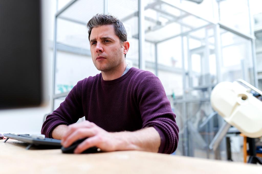 Portrait of Tom Whitfield, Head of Engineering at Neuralforge